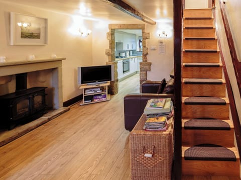 Living room and stairs | Millstone Cottage, Bradwell