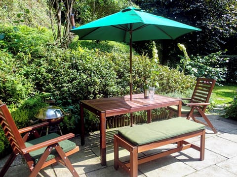 Spacious patio with seating furniture | Heale Cottage, Littleham, near Bideford