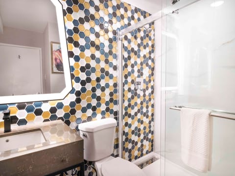 Shower, free toiletries, hair dryer, towels