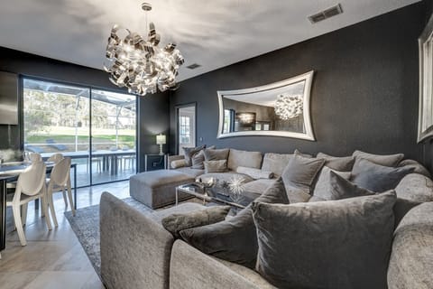 Comfortable and Entertaining living room with open floorplan to socialize with dining room as well. Start with a cocktail and move onto dining in modern social atmosphere catering for your entire family, bachelor/birthday party or corporate retreat.
