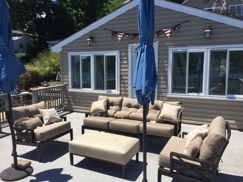Off the boathouse deck is a 4 season room which features a new Ping Pong table