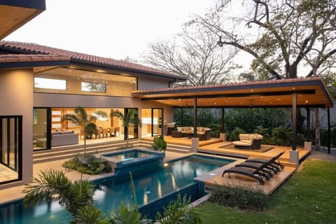 Private pool and sunbeds, view to the outdoor patio