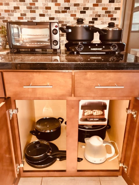 New pots and pans, crock pot,and George Forman inside grill and paninni maker.