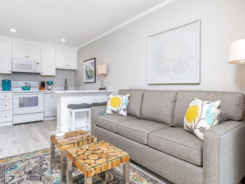 Living area with sofa and flat-screen TV