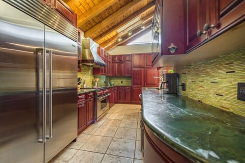 Kitchen - Fully stocked kitchen with top of the line appliances.