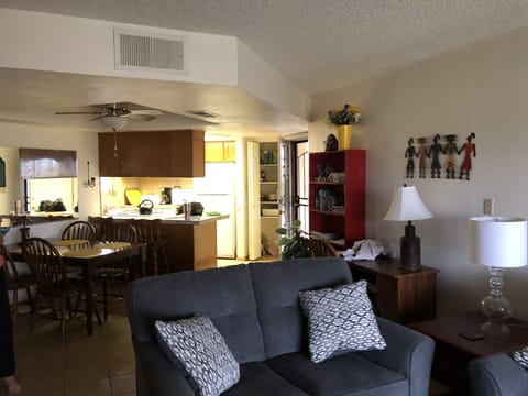 Looking toward front door and kitchen from living room