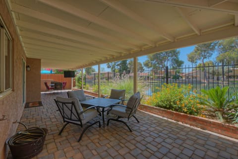 TEMPE DRIFTWOOD LAKE VIEW has a large covered patio with an enchanting view of the lake, patio TV and visiting wildlife.