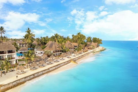 Private beach, white sand, sun loungers, beach umbrellas