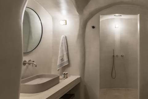 Shower, rainfall showerhead, designer toiletries, hair dryer