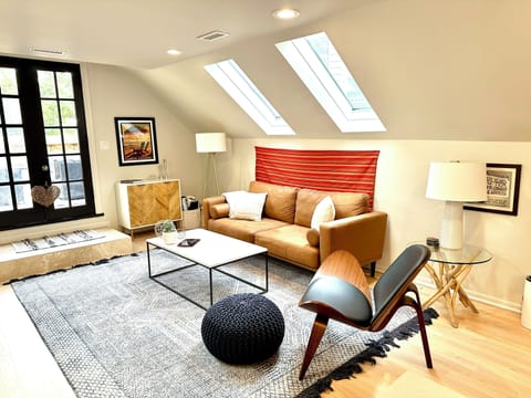 Bright and sunny owner's unit penthouse loft with private outdoor deck