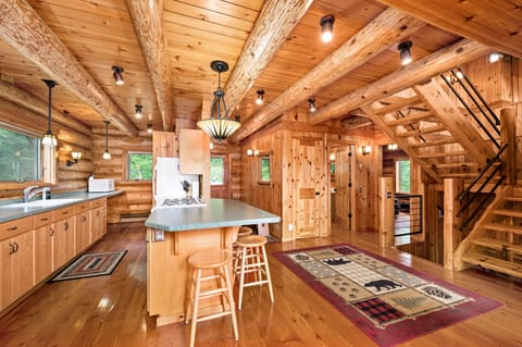 Kitchen, bathroom, and stairway to loft.