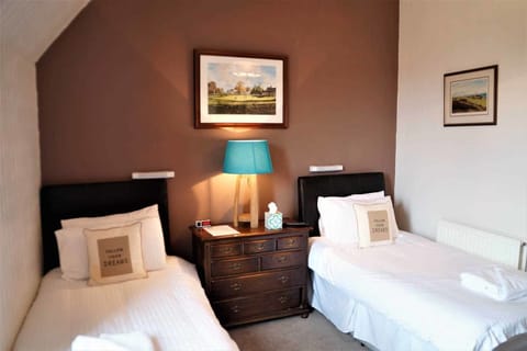 Twin Room (with Shower) | 1 bedroom, desk, iron/ironing board, free WiFi