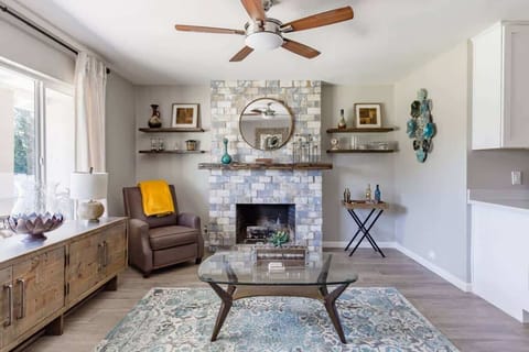 Living room right off of the kitchen and front enter. The warm grey tones feel relaxing and comfortable.