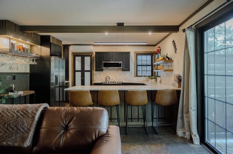 Luxury Suite, Ensuite (Evergreen Suite, Non Pet-Friendly) | Living room | Flat-screen TV, DVD player