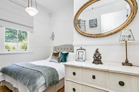 Queen master bedroom with French bed linen