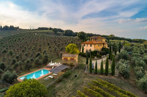 Petrolo winery: farmhouses Feriale I, II and Vigna, nestled among olive groves