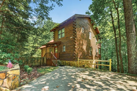 Charming log cabin nestled in the woods, perfect for a peaceful retreat.