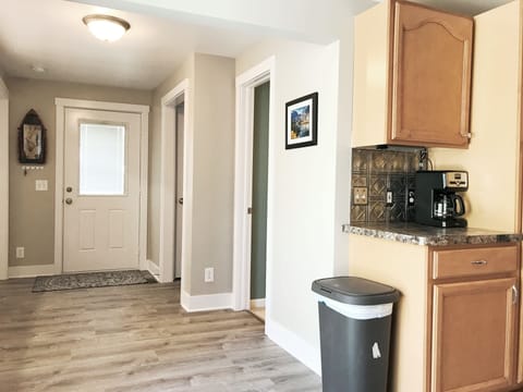 Front Entry and Hallway to Kitchen