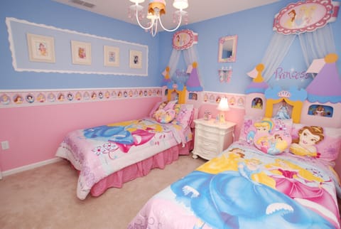 Upper level, two twin beds with Princess Decor. Little girls dream bedroom.