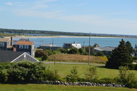 cottage in left foreground with Goosewing Beach in background