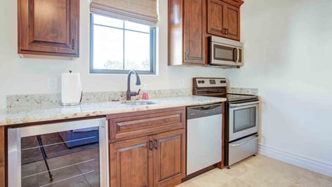 Guest House - Kitchenette w/ mini fridge, stove, sink, & dishwasher