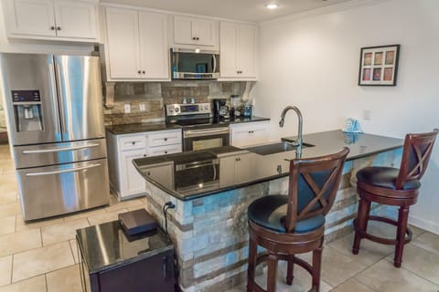 Remodeled kitchen and upgraded appliances including wine coolers