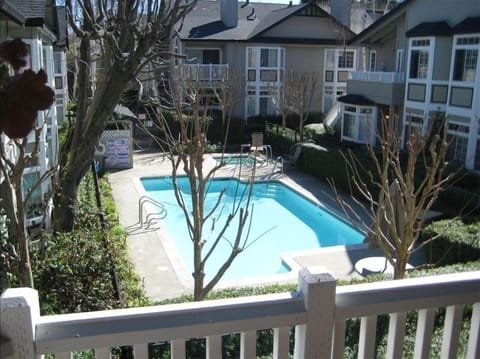 View of the pool from the living room balcony