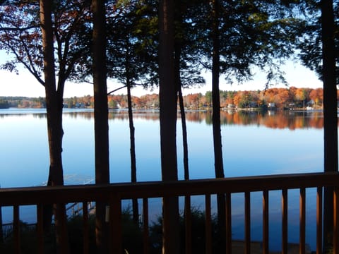 View from deck looking over our dock on a still day in last days of October.