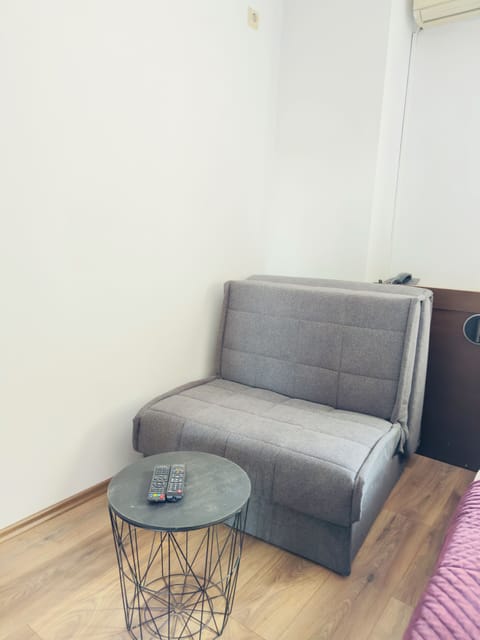 Standard Quadruple Room, 1 Bedroom | Minibar, desk, laptop workspace, blackout drapes