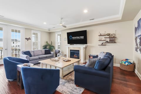 Cozy family room with fireplace and games