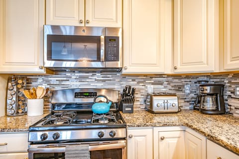 Fully-equipped kitchen with stainless steel appliances