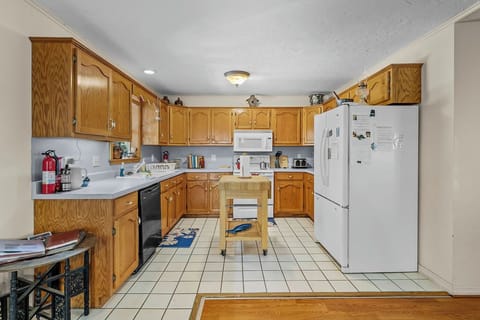 A full kitchen with everything you need to prepare meals. With a Mr Coffee type