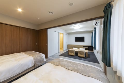 Deluxe Japanese Room and Western Style Room, Non Smoking | Desk, laptop workspace, iron/ironing board, free WiFi