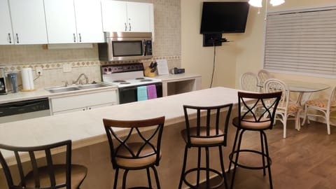 Kitchen /living area with 50" TV.