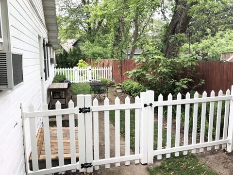 private, enclosed front patio leading to front door