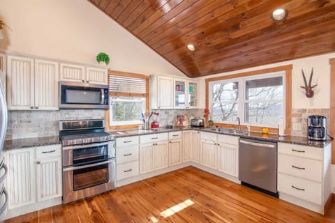 Full Kitchen with Granite Counters and Stainless Appliances