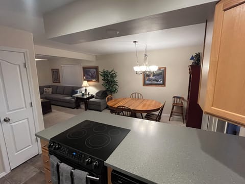 Kitchen looking to dining area and living room