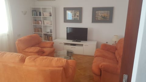 Apartment, 3 Bedrooms | Living area | Flat-screen TV