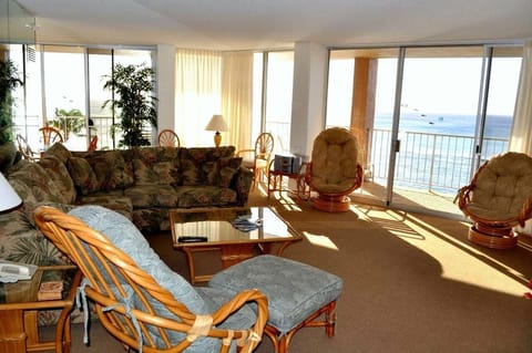 Our spacious living room sports full views of the ocean and a fold out couch.