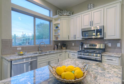 Kitchen will delight the chef and helpers although tempting window view may prove to be a distraction.