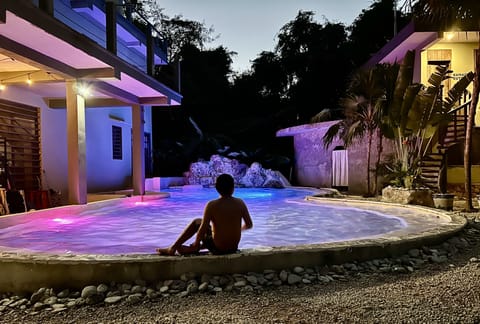 Outdoor pool, open 6:00 AM to 11:00 PM, sun loungers