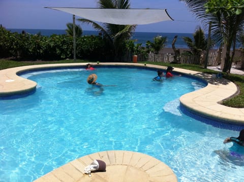 Enjoy the breeze and the view of the ocean from the pool...