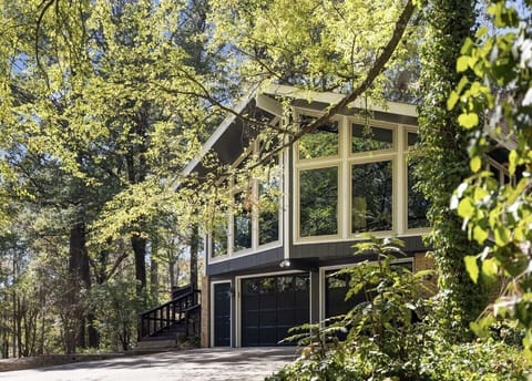 Hilltop Lodge / Front Entry Way / Concrete Parking Pad.