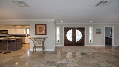 View toward front door and kitchen to the left. 