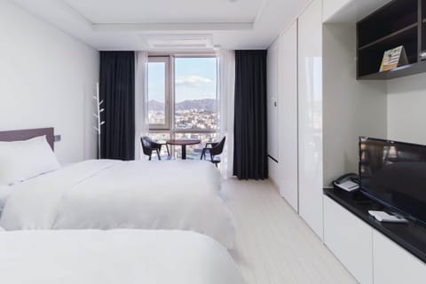 Standard Twin Room, 2 Twin Beds | Individually decorated, laptop workspace, blackout drapes, soundproofing