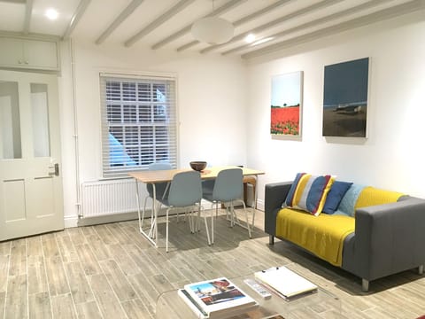 Airy sitting and dining room.