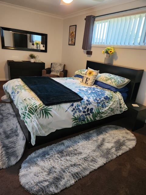 Lovely separate Master Bedroom with TV and armchair for privacy from otherguests