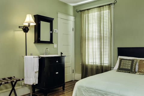 The Olive Room | Bathroom | Bathtub, deep soaking tub, hair dryer, towels