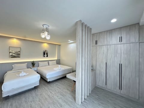 Deluxe Triple Room | Blackout drapes, soundproofing, WiFi (free), bed sheets