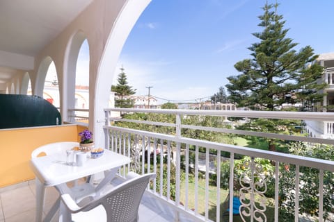 Triple Room, Garden View | Balcony view